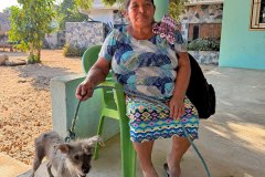 Woman and her dog relaxing on a hot day.