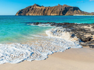 Stephens Bay with Witch Hill in the background, San Cristobal island, Galapagos, Ecuador